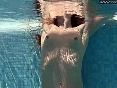 Is Nicole Pearl Shaking Her Ass In The Pool?