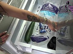 I am masturbating with a cucumber on my shaved pussy and small tits