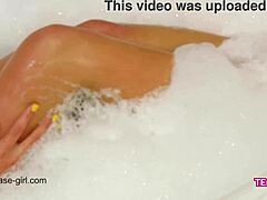 Bathing beauty in sensual scene