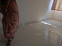 tamil maid prabha was in the middle of chores when she paused to jerk her owner's cock. her skilled hands brought quick satisfaction.