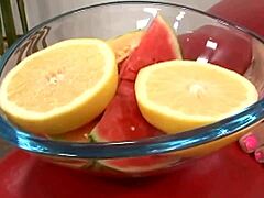 Brunette gives footjob then bends over.