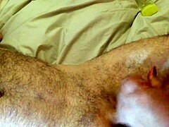 Wife with red nails gives full handjob milking huge cumshot.