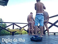 suruba on balcony with curvy redhead