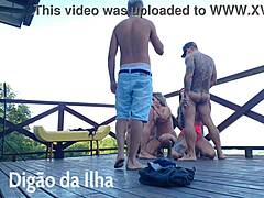 suruba on balcony with curvy redhead