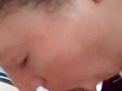 An amateur girl learns detailed blowjob techniques on a cock.