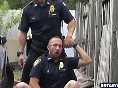 Two police officers TAKE ADVANTAGES of this black guy at work