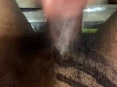 I'm PLAYING with a COUPLE of my TOYS, including a MONSTER COCK and BIG BLACK COCK for HANDJOB