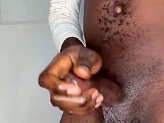 Ninja man jerks big cock to cum