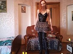 redhead in cherry overknees boots plays with ass