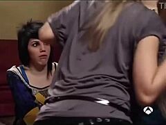 girls share a kiss during a fun game session