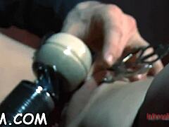Bound beauty sucks cock in tight bondage