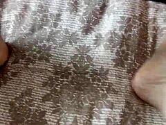 Alternative Ebony Beauty Rubs Thong on Bare Feet Sensually