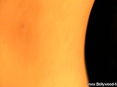 Beautiful Indian Brunette Teases with Striptease and Undressing in Bollywood Style