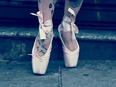 Ballerina In Ballet Shoes Walking Down Street