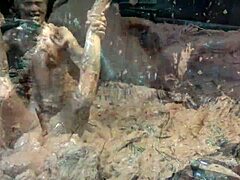 Wanna see these big-titted babes get messy in erotic nude mud wrestling catfight?