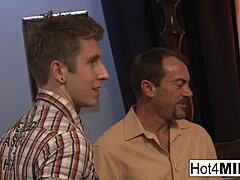 I'm da busty blonde milf dat got two hot loads on me face after sexin' wit dat babe.