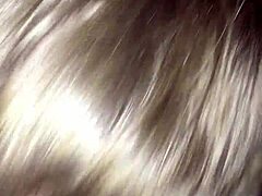 girl performing oral on a big black cock