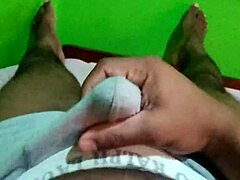 Watch this solo handjob on a black cock