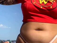 african babe flashes big pussy after tattoo on beach guy shows dick pic