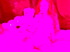 The Italian milf Artemisia Love smokes naked on the bed, displaying her big tits and playing with her pussy.