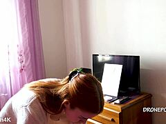 Beautiful naked redhead Karolinka applies makeup with cute European charm and small tits