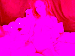 The Italian milf Artemisia Love smokes naked on the bed, displaying her big tits and playing with her pussy.