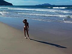 Redhead Latina Walks On Beach Publicly