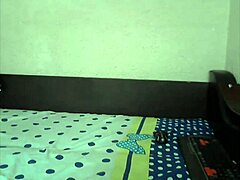 The Latina brunette engages in intimate self-touching, her fingers tracing her curves in a private moment of masturbation