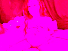 The Italian milf Artemisia Love smokes naked on the bed, displaying her big tits and playing with her pussy.