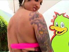 tattooed woman in intense anal scene
