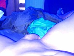 under the blacklight, this chick with black feet gives an intense footjob, sucking on toes and all that fetish stuff