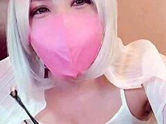 Masked asian beauty crossdresses and masturbates on stream