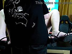 victoria camargo bent over on podcast table