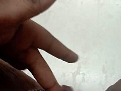 In this sexy solo video, she squirts while fingering herself