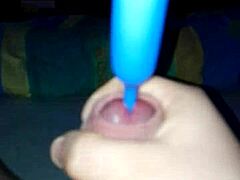 handjob with a plug-in leads to a big cumshot