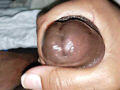 i casually stroke my big black cock in a relaxed setting