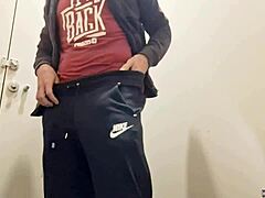 hunky stud jerks off his monster cock in public bathroom