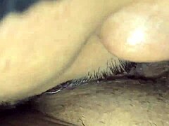 Watch the queen of squirt get her clit stimulated and squirt on monster cock.