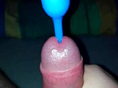 handjob with a plug-in leads to a big cumshot