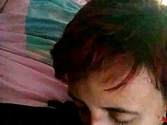 Couple enjoys intimate moment with friend watching