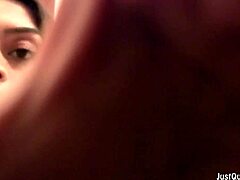 A busty amateur is relaxing by rubbing her wet hair.