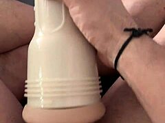 Guy plays with new fleshlight while caught watching porn and jerking off his monster cock