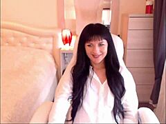 Helga Muah strips and teases with small tits?