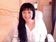 Helga Muah strips and teases with small tits?