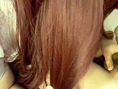 Amateur couple in costumes shares a homemade kiss and handjob moment