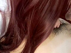 Amateur couple in costumes shares a homemade kiss and handjob moment