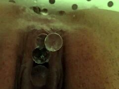 Whore squirts and pushes small 18+ eggs in bdsm oviposition