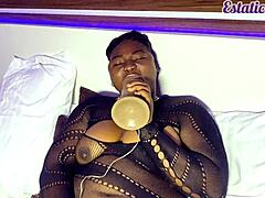 Horny girl masturbates with dildo in lingerie