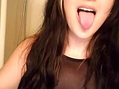 goth girl drinks from a cup