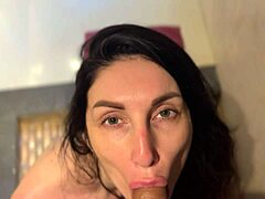 brunette milf gives blowjob in shower for real orgasm